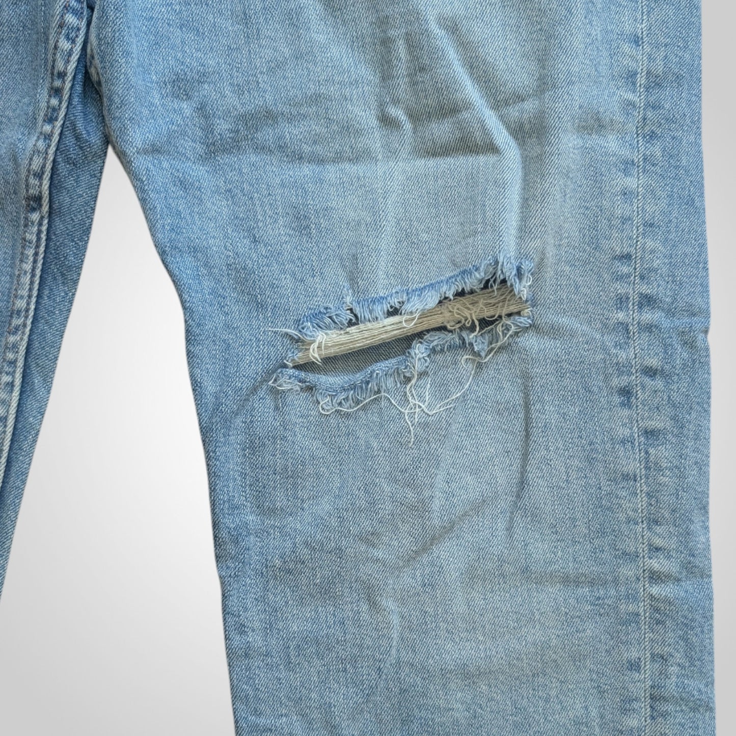 Light Blue Distressed Cropped Jeans